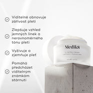 Dóza Medik8 C-Tetra Cream je zobrazena na šedém kamenném podstavci na bílém pozadí s jemnými světelnými paprsky.

Obrázek obsahuje čtyři tvrzení s odrážkami a fajfkami:

Viditelně obnovuje jas pleti
Zlepšuje vzhled jemných linek a nerovnoměrného tónu pleti
Vyživuje a zjemňuje pleť
Pomáhá předcházet viditelným známkám stárnutí