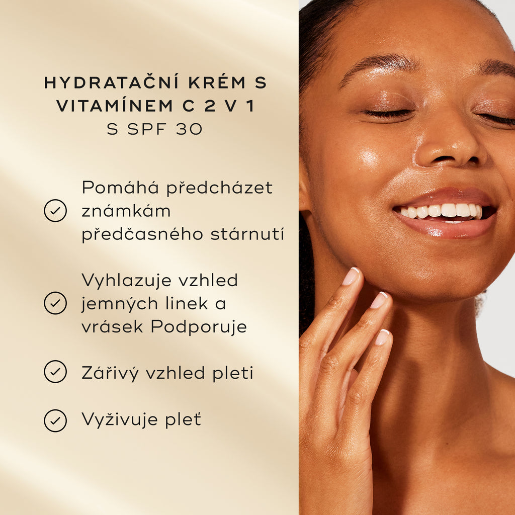 Modelka s rozjasněnou pletí se usmívá vedle seznamu benefitů produktu na jemně zlatém pozadí. Text zvýrazňuje 2v1 vitamín C hydratační krém se SPF 30:
předchází známkám předčasného stárnutí
zvyšuje jas pleti
hydratuje pleť
100 % souhlasí, že jejich pleť je po celý den chráněná