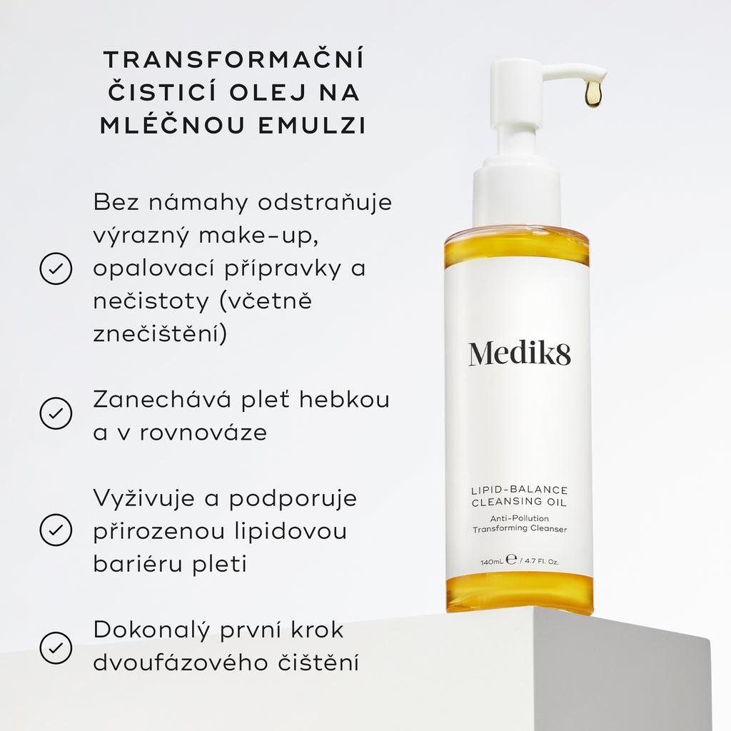 Lahvička Lipid-Balance Cleansing Oil stojí na bílém podstavci. Text uvádí benefity, včetně odstranění silného make-upu, podpory lipidové bariéry a fungování jako transformační olej-v-mléko čisticí přípravek.