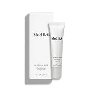 Bílá tuba Blemish SOS (15 ml) stojí vedle své bílé krabičky.